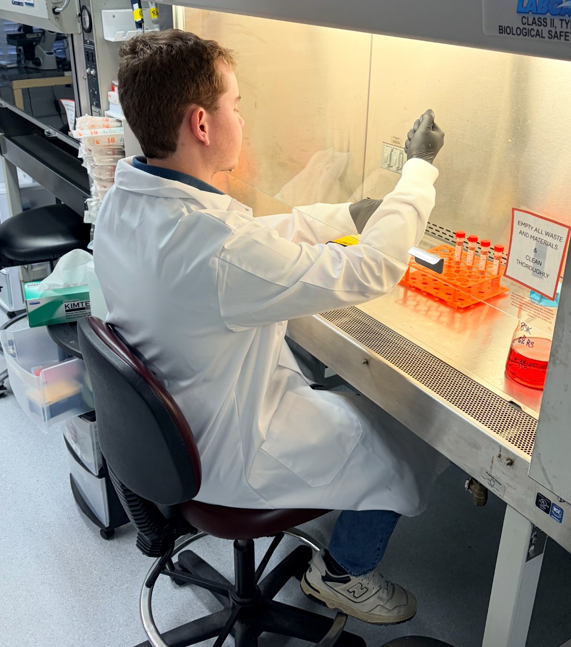 Alex Counts at wetwork station with pipette