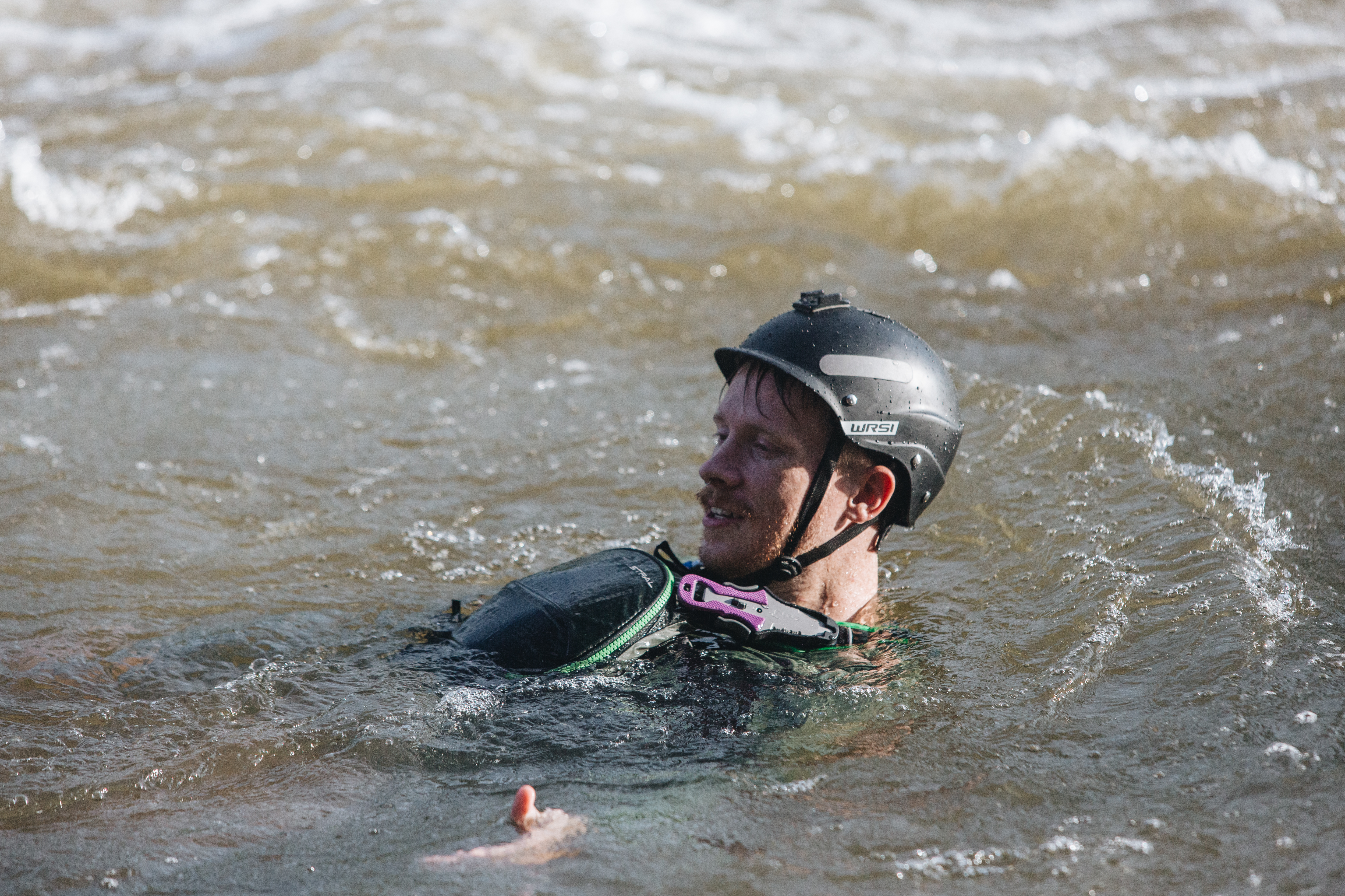 Stephen Friedrichs with protective gear in the James River showcasing how exposure to N fowleri happens